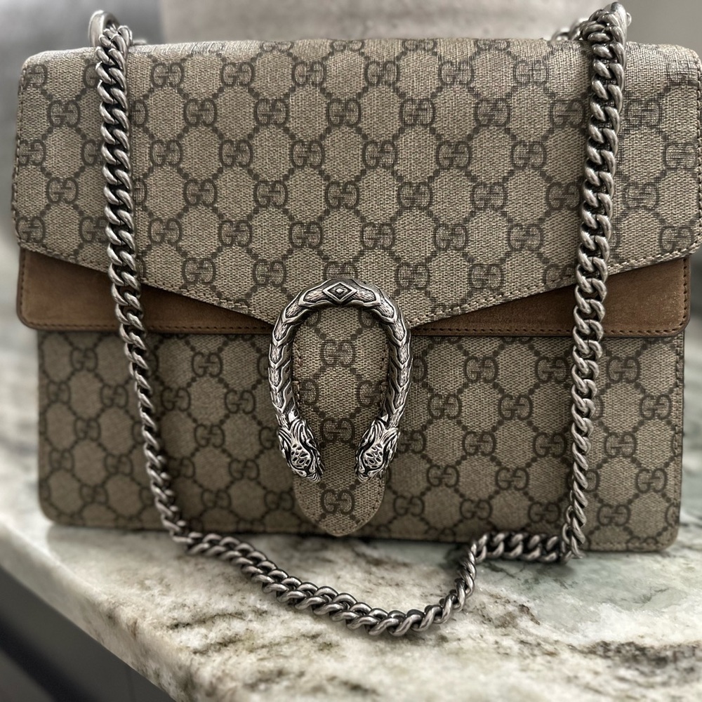 Gucci Dionysus. Authentic and nearly perfect.